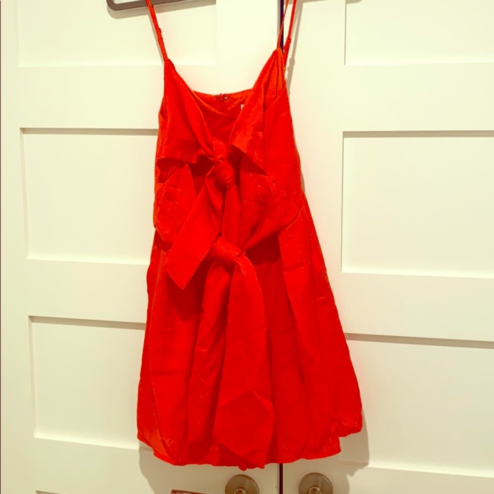 NWT Red Romper with front ties and pockets